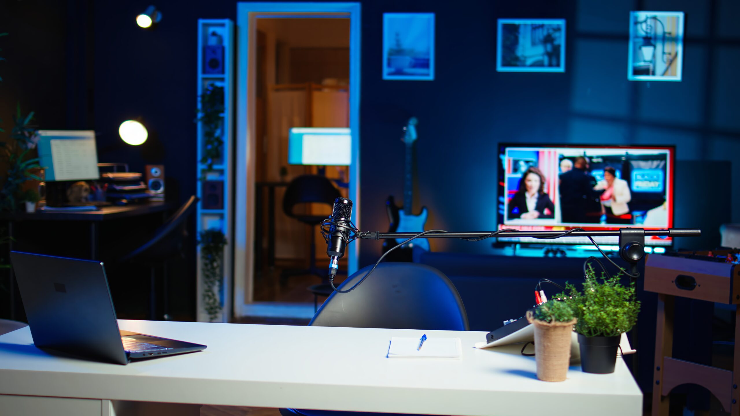 Panning shot of empty home studio with content creation gear tech